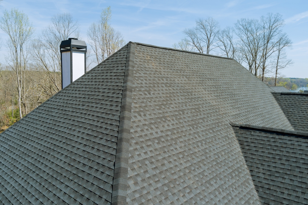 Professional roofers installing new tile roof Darlington