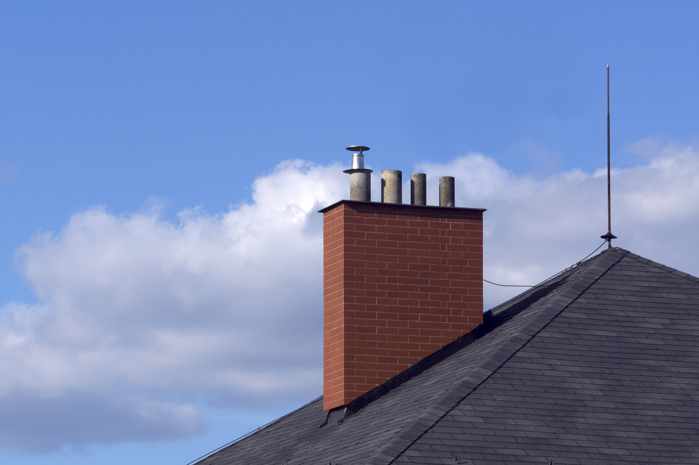 Chimney stack rebuild traditional craftsmanship matching bricks Darlington